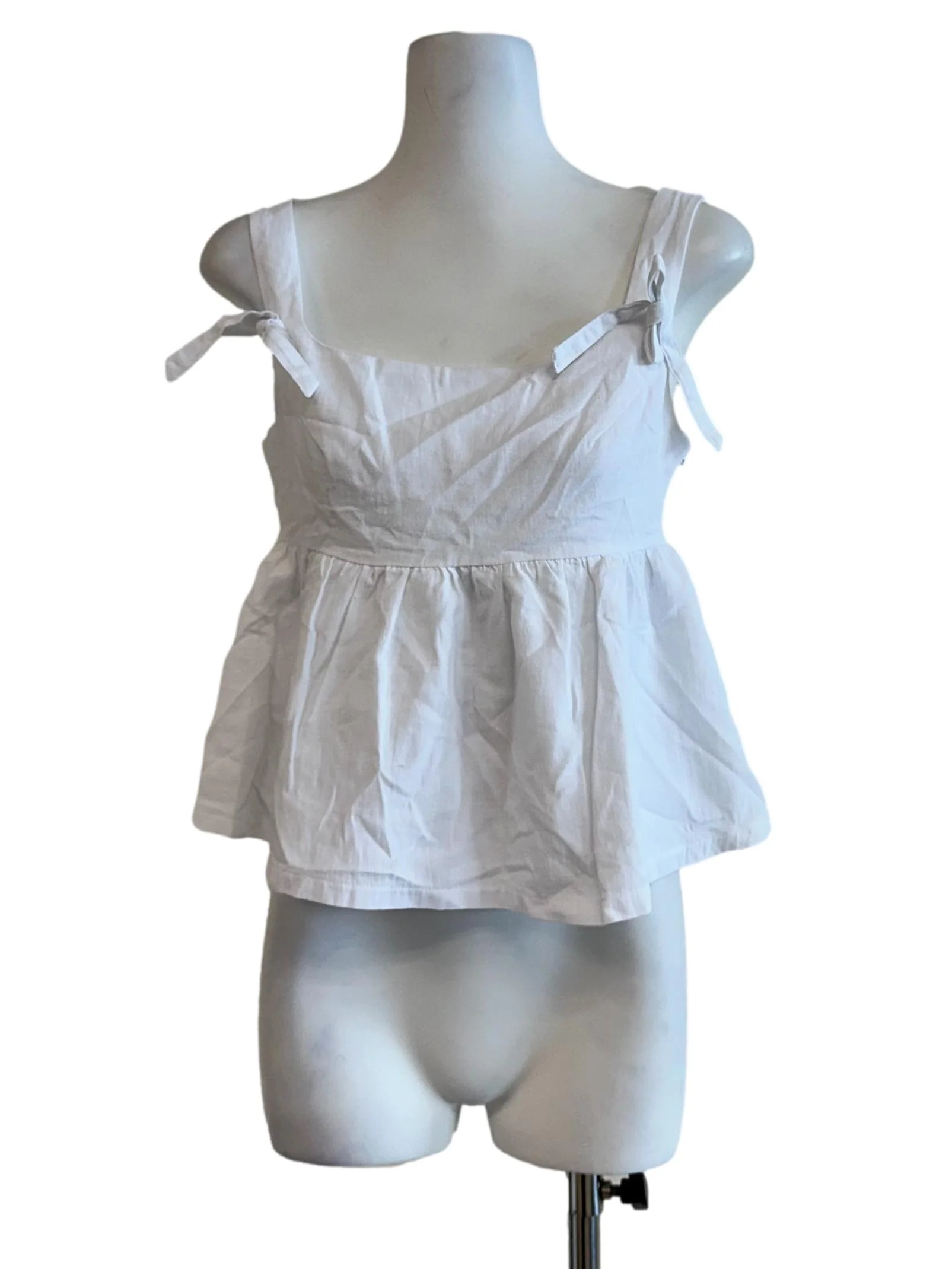 Porcelain White Peplum Sleeveless Top
